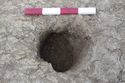Thumbnail of 110494.01_Report_Plate_05, Hornsea Offshore Wind Farm Project One, Post-excavation Assessment and Updated Project Design, Plate 5 (also Plate 2.5 in the 221790 publication - The Archaeology of the Hornsea Project One Offshore Windfarm Cable Route, Wessex Archaeology Monograph 41, 2022): SPE6 (Set Piece Excavation area 6) posthole 6044, from south.