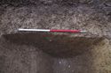 Thumbnail of 110494.01_Report_Plate_07, Hornsea Offshore Wind Farm Project One, Post-excavation Assessment and Updated Project Design, Plate 7 (also Plate 2.7 in the 221790 publication - The Archaeology of the Hornsea Project One Offshore Windfarm Cable Route, Wessex Archaeology Monograph 41, 2022): SPE5 (Set Piece Excavation area 5) ditch 5201 (intervention 5078), from west.