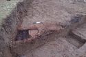 Thumbnail of 110494.01_Report_Plate_59, Hornsea Offshore Wind Farm Project One, Post-excavation Assessment and Updated Project Design, Plate 59 (also Plate 3.15 in the 221790 publication - The Archaeology of the Hornsea Project One Offshore Windfarm Cable Route, Wessex Archaeology Monograph 41, 2022): SMR2 (Strip, Map and Record area 2) flue 9521, from east.