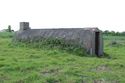 Thumbnail of 110497_HBR_Image_030, Historic Building Recording Report 110497.03 Plate 30, view of south side of Air Raid Shelter 1, with escape hatch visible at the rear.