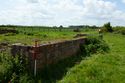 Thumbnail of 110497_HBR_Image_046, general view of a brick-built wall within the Second World War site.