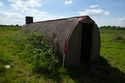Thumbnail of 110497_HBR_Image_050, general view of an air raid shelter within the Second World War site.