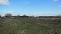 Thumbnail of Open field near working site