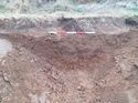 Thumbnail of North facing shot of Subsoil, Natural and Topsoil, (2001), (2002) and (2004), 1x1m scale