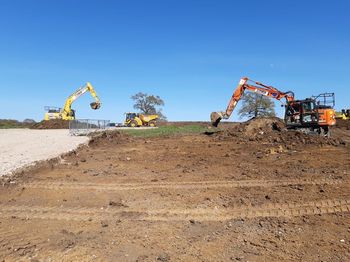 Northeast facing shot of topsoil strip, and stockpile removal. Copyright: HS2