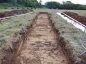 Thumbnail of East facing shot of Trench 9, no scale