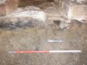 Thumbnail of <em>E-facing view of section through boulder plinth (611) and culvert F.313</em> <br  />(FEN15_20.jpg)