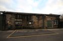 Thumbnail of View of the weighing bridge adjacent to the south elevation of the former mule spinning shed, 2m scale.