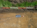 Thumbnail of Photograph of a sample section in trench 1, facing North/North-East with 2m scale. Taken during an archaeological evaluation at Milken Lane, Ashover, Derbyshire