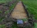 Thumbnail of East facing pre-excavation shot of trench 3 (1m x 2m scale) taken during archaeological evaluations at Milken Lane, Ashover, Derbyshire