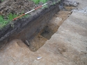 Thumbnail of West facing post-excavation shot of linear boundary ditch [105] taken during archaeological evaluations at Milken Lane, Ashover, Derbyshire. No board