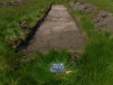 Thumbnail of West facing pre-excavation shot of trench 5 taken during archaeological evaluations at Milken Lane, Ashover, Derbyshire (1m x 2m scales)