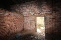 Thumbnail of Shot of the doorway positioned along the south-east wall of G8 at Highfield Farm (2m scale)