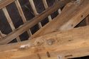 Thumbnail of Shot of carpenter marks on the wooden truss in F6 at Highfield Farm