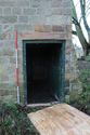 Thumbnail of View of the doorway leading into G11 at Highfield Farm (2m scale)