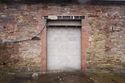 Thumbnail of Detailed view of the modern inserted door in the north eastern elevation, facing south west.