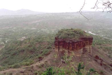 Looking out across Olduvai Gorge on a wet day in December