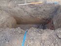 Thumbnail of W facing section of hole dug in Trench 1; view E