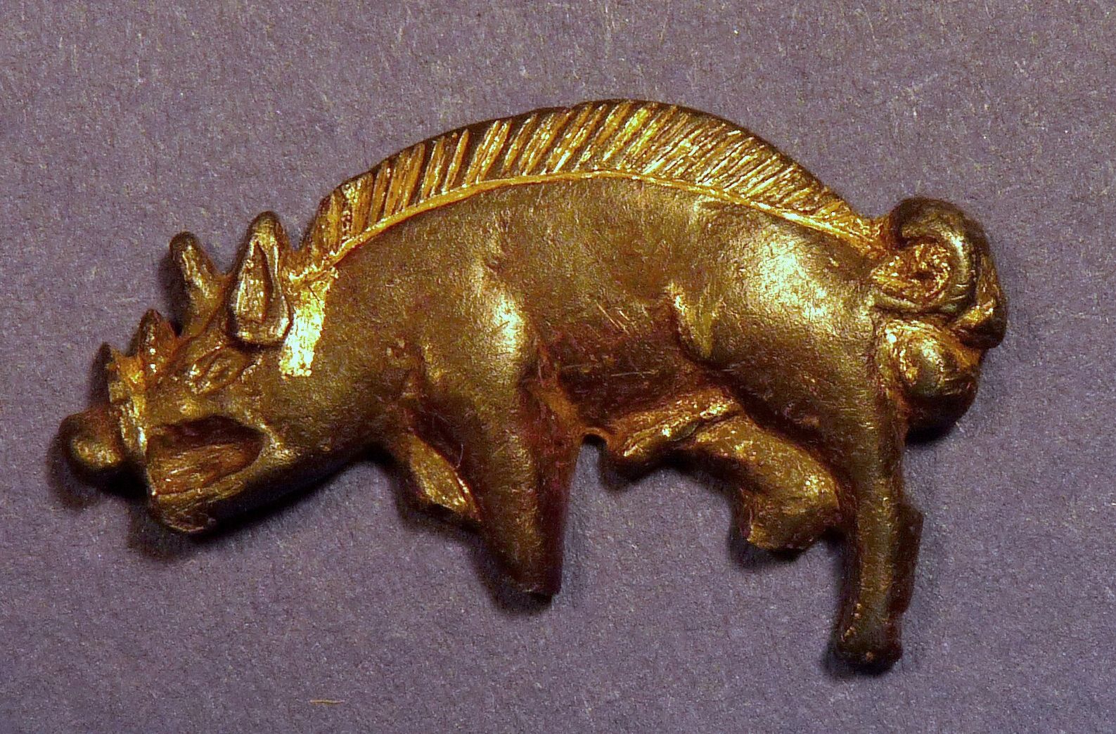 Image of A silver badge in the form of a boar