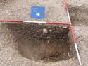 Thumbnail of Excavated quadrant of a pit, showing clay deposit