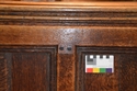 Thumbnail of Detail upper front frame of plain pew looking west