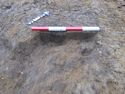 Thumbnail of NW facing shot of pit 1056 and posthole 1058