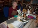 Thumbnail of Conservation volunteer Pat at the microscope