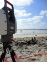 Thumbnail of The Leica Scanstation looming over its sandcastle victim at the beach.