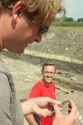Thumbnail of Jim Leary and David Roberts consider a worked flint