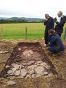 Thumbnail of Talking through findings with one of the excavators