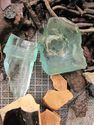 Thumbnail of Archaeological finds including glass and metal.