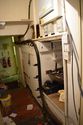 Thumbnail of Ground floor, passage between rooms B and A, recesses to E wall, looking NE