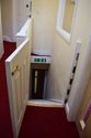 Thumbnail of First floor, stairs giving access to 19th century addition to Hall’s E wing, looking W