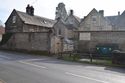 Thumbnail of Roadside boundary wall and gateway to yard, looking SE