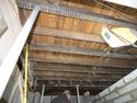 Thumbnail of Ground floor, west room (D), ceiling prior to cutting for new lift shaft, looking E