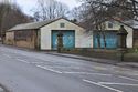 Thumbnail of East range, western extension, north gable, and cemetery boundary wall to Green Hill Road, looking S