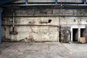 Thumbnail of Weaving shed (Unit C), south end of west wall, showing bearing box from northern engine house, looking W