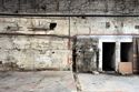 Thumbnail of Weaving shed (Unit C), south end of west wall, showing bearing box from northern engine house, looking W
