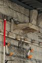 Thumbnail of Weaving shed (Unit C), west end of south wall, showing transmission bracket, looking SW
