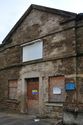 Thumbnail of Ilkley Road frontage, c.1857 original part (Unit G), central entrance and pediment, looking N