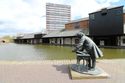 Thumbnail of James Brindley Statue with industrial warehouses to rear, Coventry Canal Basin