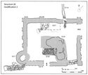 Thumbnail of 21.15 Plan of the prior's kitchen S28 modification 2 in phase 5.5, mid- to late 14th century. The south-east door was blocked but a line of masonry was added to SS17 to form a passage between S28 and the guest hall S29. A new oven SS57, hearth SS38, and drain CF14 were inserted