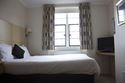 Thumbnail of Bed Area Room 210