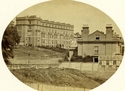Thumbnail of Bayley (Red Cross) Auxiliary Hospital established in private residence at 7 Clinton Terrace, Derby Road, Wollaton, Nottingham. Historic photo of Clinton Terrace viewed from the park, with no 7 near end of the terrace.