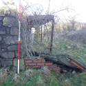 Thumbnail of Former Brushes Rifle Range (Brushes Road, Stalybridge, Tameside, Greater Manchester). End of rifle range gallery, destroyed markers box, possible prone lying banking on right, facing North.
