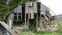 Thumbnail of Nissen Hut, now located at West Deloraine FarM (Ettrick Valley, Selkirk, Scottish Borders). Facing north, showing south side of building