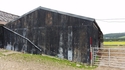 Thumbnail of Accommodation Hut, now located at West Deloraine Farm (Ettrick Valley, Selkirk, Scottish Borders). Facing east, showing west side of building