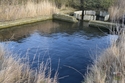 Thumbnail of Kynochs Munitions Works (Coryton Oil Refinery, Corringham, Thurrock, Essex). Photo of water or sewage works/water vessel of some form.