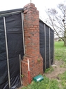 Thumbnail of Dark Peak Fell Runners Club hut (Redmires Road, Sheffield, South Yorkshire) fortmerly an accommodation hut at Redmires Camp. The exterior of the accommodation hut, taken facing north east, showing detail of brick built chimney.