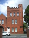 Thumbnail of Lancaster House, formerly Chorley Drill Hall (Devonshire Road, Chorley, Lancashire). Side elevation of tower, Hamilton Road.